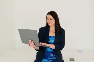 Professional woman working on a laptop